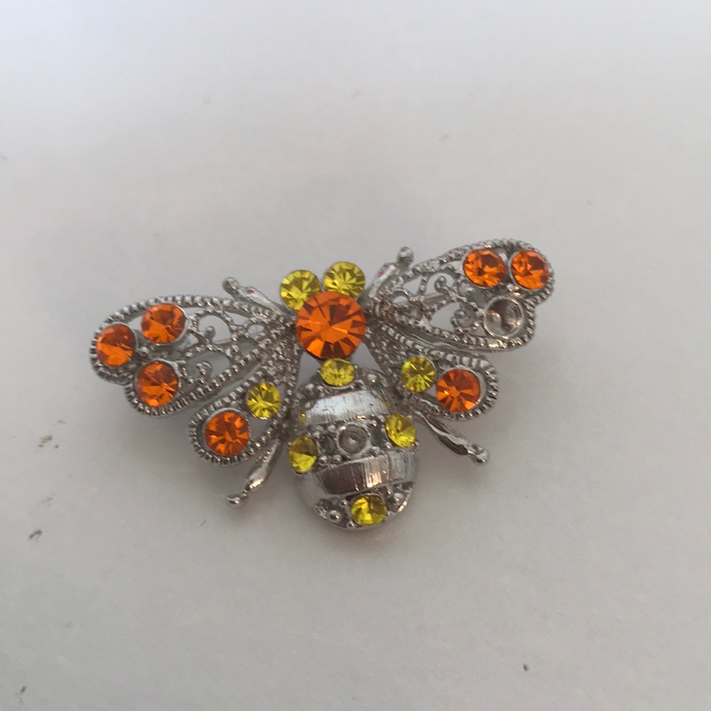 Silver, orange and yellow crystal brooch